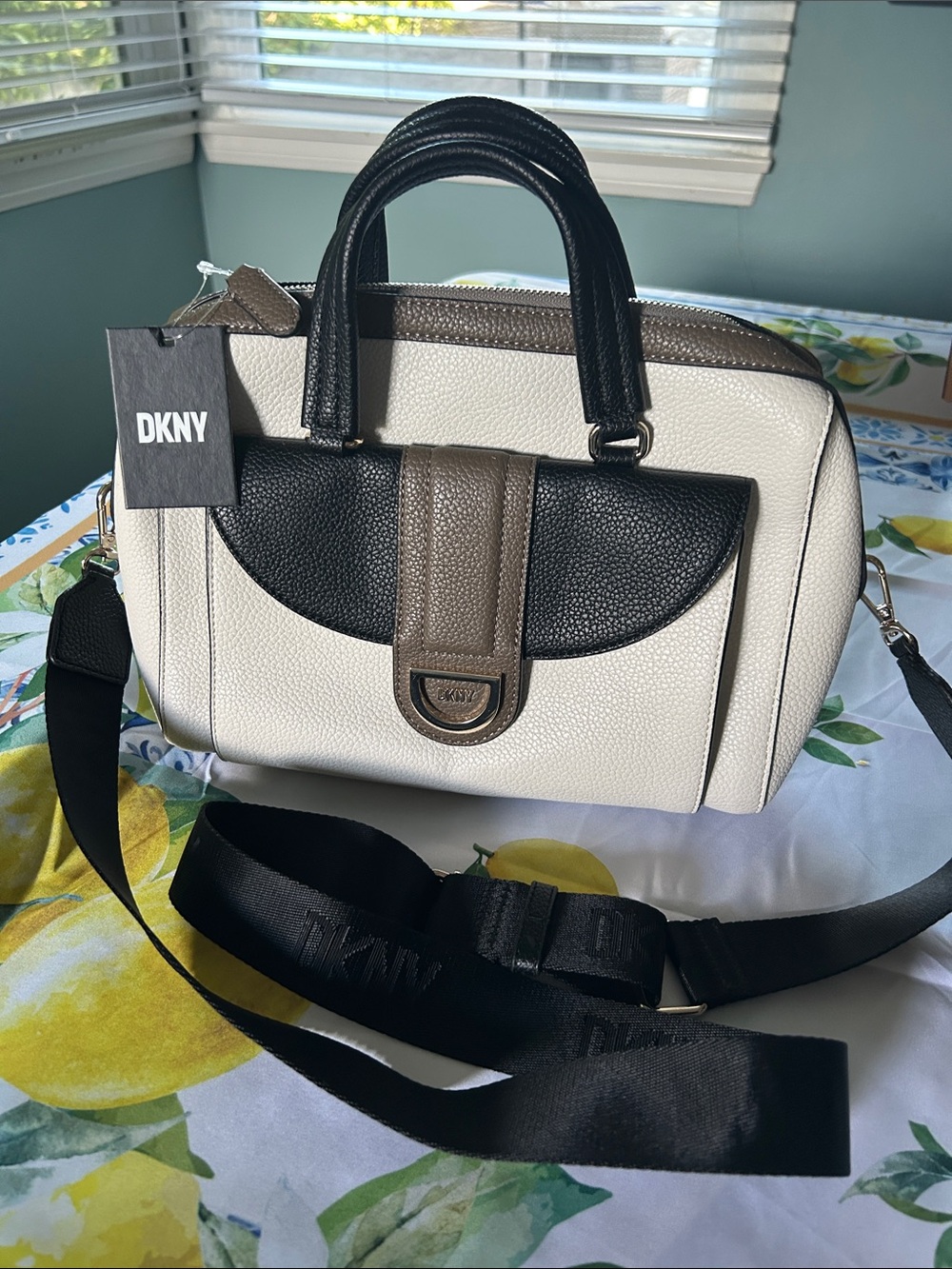 DKNY Cream Pebbled crossbody with Black Handles and Taupe Trim